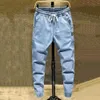 Mäns jeans trendiga män jeans elastiska midja streetwear bottnar hög midja ankel bundet harem pantl2403
