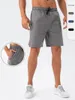 Running Shorts Mężczyzna oddychający luźne spodnie Odbijowe paski dresowe krótkie spodnie Szybki suchy szlafraty