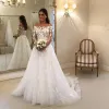 long sleeves Graceful wedding dresses sheer bateau neck lace covered buttons bridal gowns sweep train tulle country robe de marie