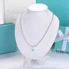 Tifaniym classique version haute T Home émail 4 m perle coeur bleu amour bouddha collier femmes blanc cuivre plaqué argent épais CNC acier estampé pendentif en forme 8VNL