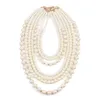 Un ensemble de 7 rangées de perles rondes en acrylique blanc, collier et boucles d'oreilles, 240305