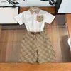 Mode Kids Tracksuits Child Summer Two Piece Set Maat 100-150 Designer Baby Dessen Splice Design Shirt en Logo Printing Shorts 24Mar