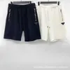 Herr shorts designer trendiga märke 24SS street trendig triangel logotyp mångsidig lös passande par nylon lapptäck shorts q8z5