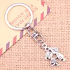 Keychains 20st Fashion Keychain 16x27mm Lover Boy Girl Pendants Diy Men smycken bil nyckelkedja ringhållare souvenir för gåva