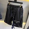 Mens Sports Suit Nylon Shirts Designer Luxury T Shirt Metal Triangle Waterproof Fashion Quick Dry Shorts Set