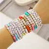 14 pièces/ensemble Taylor Swiftie bracelets à breloques 13 minuit Evermore lettre de réputation étoile dorée coeur rouge brins de perles bijoux d'amitié extensibles cadeaux pour les fans de TS