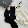 Chaussettes de sport noires pour hommes et femmes, 1 paire, Tube respirant de styliste pour l'extérieur, Skateboard, Couple, TPGW