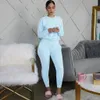 2 stuks Set Fashion Women Tracksuits Lange mouw Solid Color Pullover T -shirt High Taille kant -up Pant Outfits Casual 240326