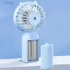 Ventiladores eléctricos 2023 Ventilador pequeño de mano Nuevos explosivos Estudiante Batería seca al aire libre Portátil Mini K2 Cat Lindo 5 hojas Refrigeración de aviación 240316