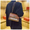 Liquidazione della fabbrica Nuova borsa calda del progettista Borsa quadrata stile francese Catena Casual Spalla High-end Trendy