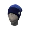 Designer hatt män beanie kvinnor stickad mössa lyxig motorhuv/vinter utomhus varm mode klassisk hatt