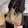 Sac en toile fourre-tout de loisirs pour femmes sac à main de grande capacité étudiants coréens japonais sac à bandoulière à bandoulière unique pour la classe 240315