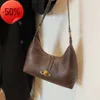 Sac à main à bandoulière simple et tendance pour femmes, magasin d'usine, avec Design de Niche, nouveau sac à main Texture haut de gamme 2024