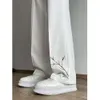 Pantaloni lunghi casual leggeri da uomo maturi estivi versatili e larghi in stile cinese con ricamo a foglia di bambù, pantaloni lunghi casual, taglio slim