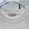 トップデザイナーサマーウーマンズスーツスカートセット新しいTシャツプリーツスカートレター刺繍コットンラビットTシャツカレッジウィメンズツーピースセット