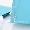 High Edition tiffay and co Circular Hollow out Key Necklace with 18K Rose Gold Steel Print on White Copper for Women Personalized Versatile Diamond Set Pendant QEQD