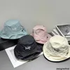 Designer Jin Hat Estate per bambini Nuova protezione solare e ombrellone Cappello da ciotola Moda da viaggio all'aperto Edizione coreana Viso appariscente Piccolo cappello da pescatore Maschio L8C6 45LI