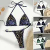 Swimwear féminin 2pcs / ensembles Femmes Sexy Bikini Set Leopard Imprimerie Halter Bra Faux Pearls Brief