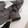 Bolsas elegantes dos principais designers bolsa início da primavera nova bolsa feminina moda tote um ombro impresso violino pontuação portátil