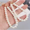 Porte-clés personnalisé blanc perle pavé porte-clés perlé pour les femmes à la mode tempérament simple porte-clés clés de voiture sac décorer couple bijoux