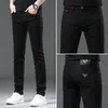 Jeans pour hommes Marque de créateur Hong Kong Incolore Automne et hiver Jeans noirs épais, coupe slim élastique, pantalons longs polyvalents pour petits pieds, pantalons 4RCW