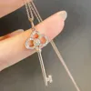 Designer de alta versão V-ouro tiffay e colar chave co para moda feminina com pingente de girassol de diamante coroa íris clavícula suéter corrente