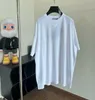 2023 Primavera y verano Nueva impresión de algodón de alta calidad Manga corta Panel de cuello redondo Camiseta Tamaño de la UE Color Negro Blanco Diseñador Camiseta Moda