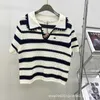 Two Piece Dress Designer 24 Spring/Summer High end New Fashion Color Contrasting Polo Neck Knitted Stripe Short Sleeves+Elastic Waist A-line Half Skirt Set FA50