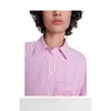2024年春/夏の新Majeデザイナーフラワーエブロディリーシャツラペルボタン怠zyなフランスの長袖女性のトップピンクのストライプ汎用シャツ