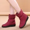 Botas nuevas botas de nieve botas cortas impermeables y no lipes más el terciopelo engrosamiento de botas para mujeres botas de nieve casual de tubo midube