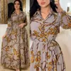 Sukienki swobodne modne francuskie eleganckie dla kobiet lato retro druk muzułmański Dubai Abaya Lapel z pojedynczą koszulą z długim rękawem Sukienka 427