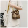 Bolsas elegantes dos principais designers Bolsa balde para mulheres Novas mulheres na moda e na moda impressas crossbody de alta qualidade ombro versátil