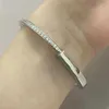 Tifaniym classique minimaliste serrure en forme de U couple demi-cercle diamant incrusté bracelet niche deux tons tempérament à la mode haut de gamme sentiment léger luxe JG68