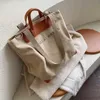 Canvas väskor Tygväska Kvinnors kapacitet Shopping Travel Pendling handhållen axel Instagram -stil