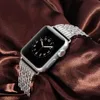 Luxury Diamond Armband för Watch Ultra 49mm 41 45mm 38mm 40mm för iWatch Series 8 7 4 5 6 44mm 42mm Women Metal Wristband 240311