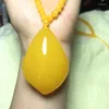 Pendentif Colliers Baltique Ambre Poulet Beurre Jaune Goutte Pendentifs Hommes Femmes Chandail Chaîne Succinum Miel Cire Collier Chanceux Amulette Cadeaux