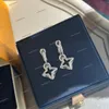 Starlight Snowflake Sparkle Boucles d'oreilles pour femmes Plaqué or glamour Zircon Fleur Style boucles d'oreilles Luxe V Haute Couture Bijoux pour femmes Mode Dangle Lustre