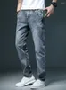 Pantaloni jeans elasticizzati elasticizzati da uomo Pantaloni da cowboy vintage di grandi dimensioni da uomo Abbigliamento da lavoro dritto 2024 Moda originale di alta qualità