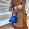 Borse da sera Borsa a triangolo di lusso Design piegato Tote di marca Corda intrecciata Catena Cellulare Messenger a mano Secchiello con petalo increspato Donna