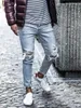 Jeans skinny azzurri uomo Streetwear Jeans strappati distrutti Homme Hip Hop modis rotto maschio Matita Biker Scava fuori pantaloni Jean 240311