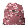 Baskar som blomstrar japanska körsbärsträd beanies stickad hatt asiatiska blommor blommar rosa blommor