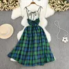 Party Dresses 2024 Sommaren backless Plaid Green Spaghetti Strap Dress Women Slash Neck Slip Korean Elegant Casual Holiday Beach