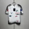 Summer Men Women Designers T Shirts Loose Oversize Tees Apparel Fashion Tops Mans Casual Chest Letter Shirt Luxury Street Shorts Sleeve Clothes Mens Tshirts Nice