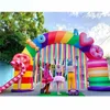 Arco gonfiabile per dolciumi a tema arcobaleno attraente da 7 m di larghezza con nappe colorate fantasia dolce palloncino ad arco con pan di zucchero per la decorazione della festa