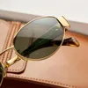 Occhiali da sole estivi con paralume piccolo ovale da festa montatura in metallo dorato per donna estetico designer di marca colore neutro UV400