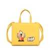 55% korting op online verkoop Niche Design Cartoon Character Handheld Texture Light Bags