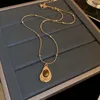 Hanger kettingen maillard titanium stalen tijger oog drop ketting Franse retro niche trui ketting mode licht luxe temperament vrouwen