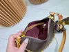 Luxury Designer Bag Croissant Bags äkta läder kvinnors väska brun blomma vintage underarmsäck ladys mode mångsidig axel crossbody väska m45832 plånbok