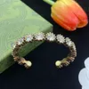 Bracciale di design Braccialetti di marca di lusso firmati per donna Design di lettere di alta qualità con diamanti Cento bracciale rigido con corpo regalo di Natale Portagioie molto buono