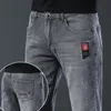 Moda jeans masculino estilo coreano em linha reta cinza calças de cintura média masculino casual denim 240315